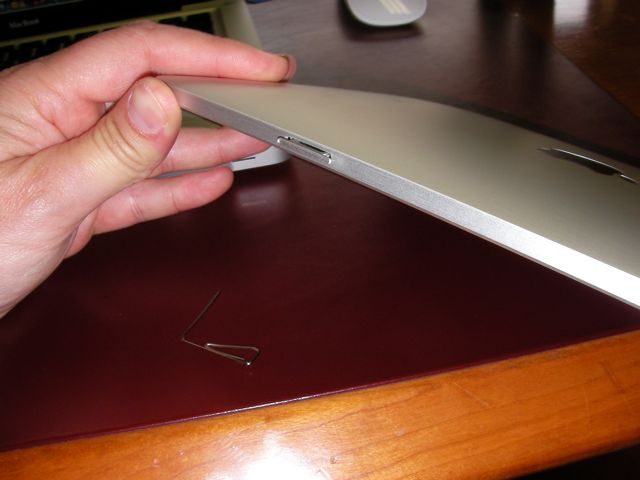 Find the sim card slot in your iPad (it is on the bottom left of the iPad).